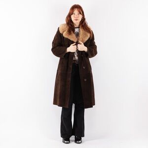Made in Canada vintage brown sheepskin shearling coat with a fur collar.